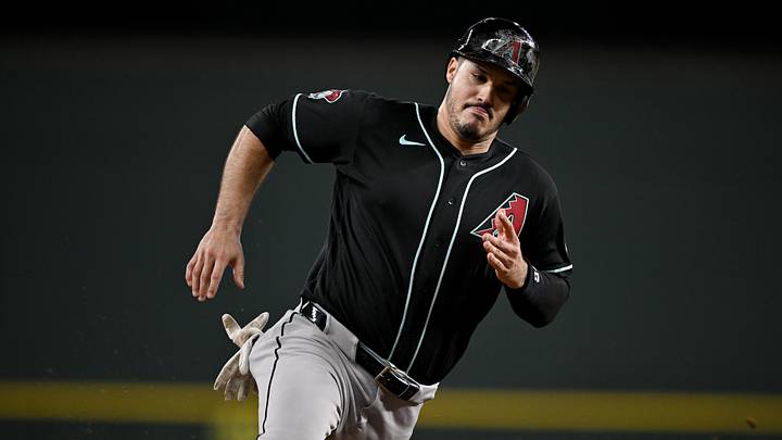 May 13, 2026; Arlington, Texas, USA; Arizona Diamondbacks third baseman Nolan Arenado (28) scores run against the Texas Rangers ninth inning at Globe Life Field. Mandatory Credit: Jerome Miron-Imagn Images