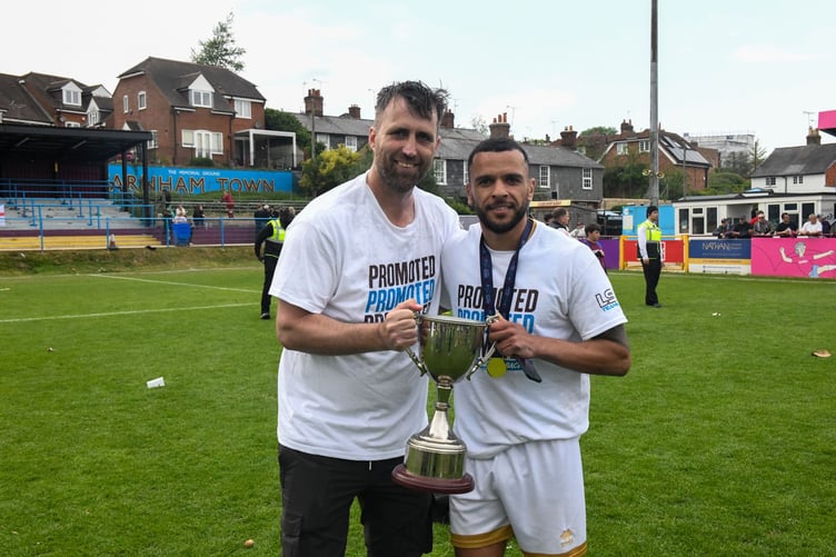Farnham Town manager Paul Johnson (left) celebrates with hat-trick hero Billy Clifford