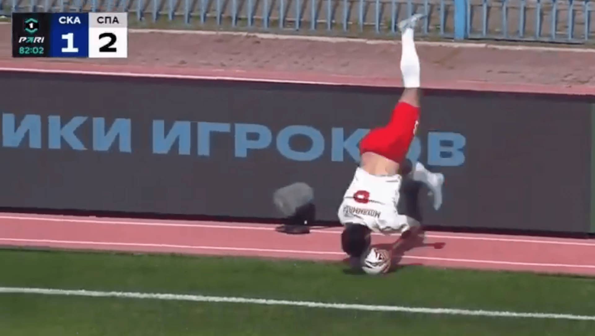 Nader Mohammadi performs a somersault throw-in